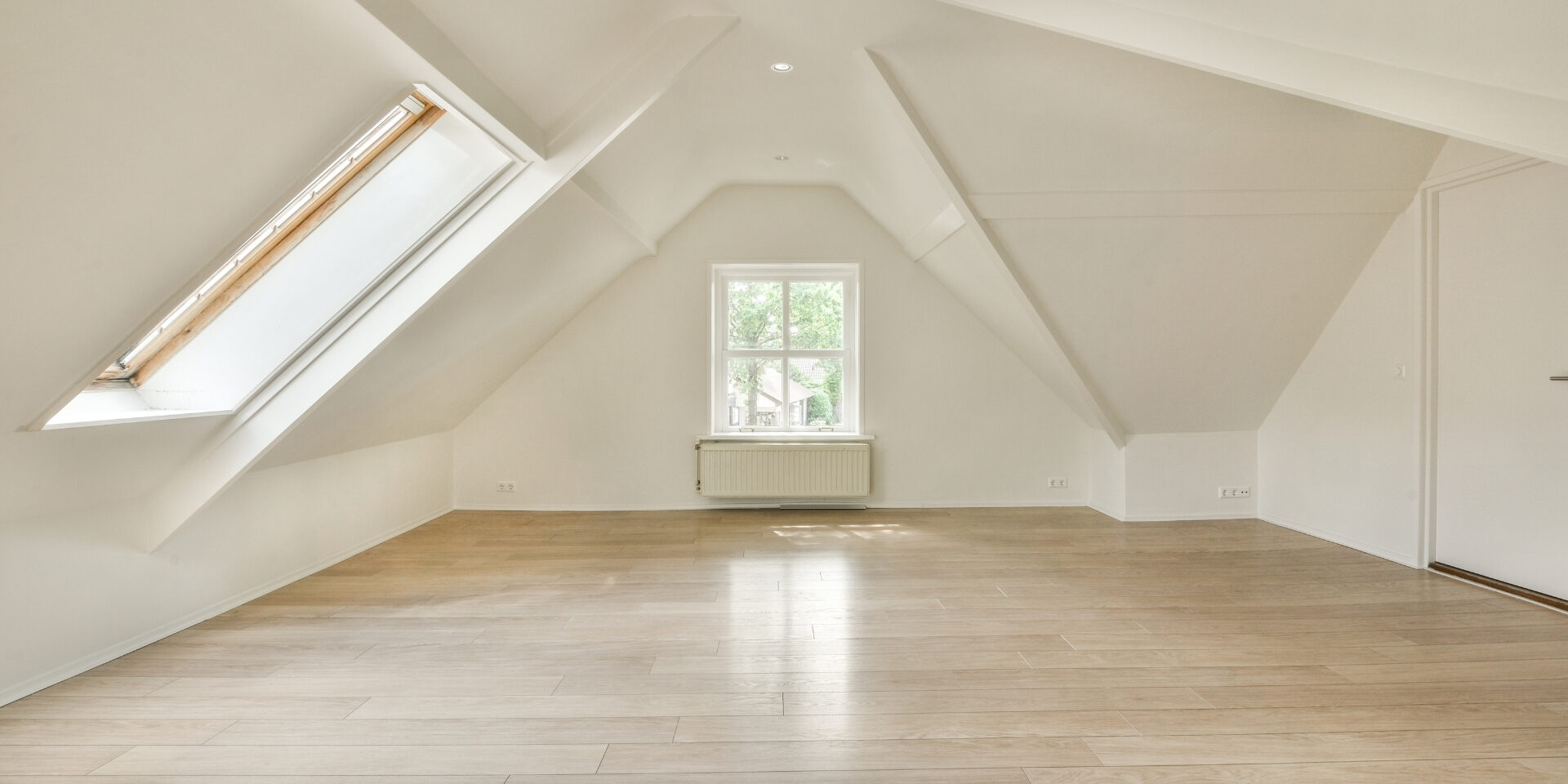 Loft conversion with dormer window and bright interior