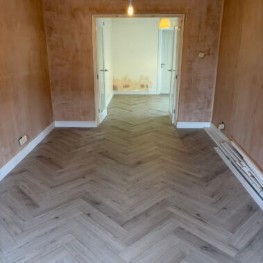 Oak herringbone LVT flooring installation